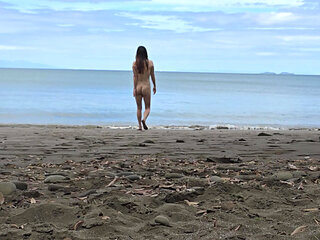 Korean teen walking naked on the beach with perfect tits