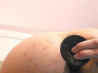 Thick long butt plug deep in the ass