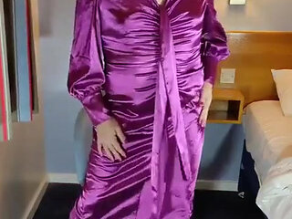 Hot crossdresser in full erotic purple satin