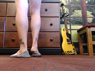 Gray ballet flats standing shoe play