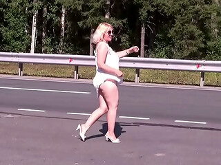 Hot MILF on the road seduces with her ass