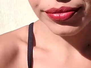 Smoking with Her Breasts Out