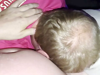 Step son enjoying cartoons while step-dad gives him blowjob while in bed
