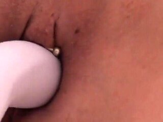 Playing on the bed with my sex toy