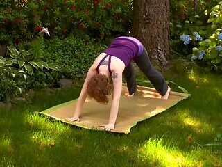 Eliza trys out yoga, hairy style in this outside videos, sure to