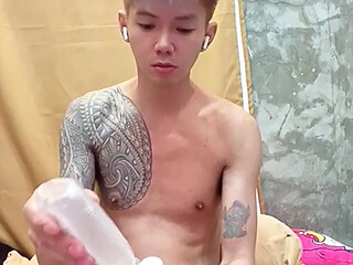 Inked Asain Boy Playing with His Anal Vibrator Toy
