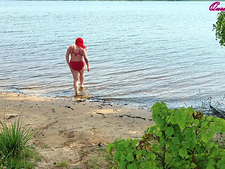 MILF gives blowjobs by the riverside