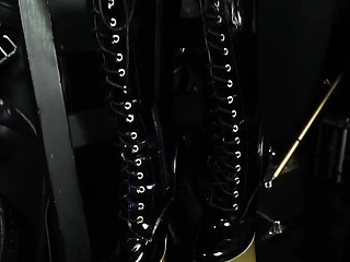 Goddess Vivienne L'amour dominates slave Mila in intense bastinado session.