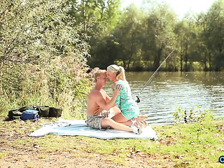 Affectionate couple shares horny moments in nature near the Clear River