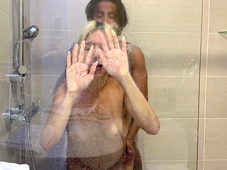Skinny blonde teen takes a hard fuck in the shower