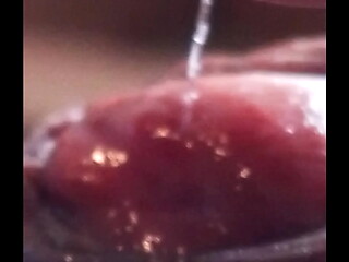 Leaking precum, extreme closeup. July 20, 2024.