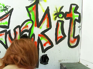 Whenever the busty redhead is in need of a cock she visits her favorite gloryhole