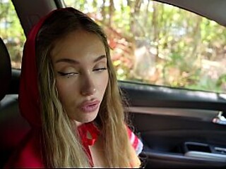 Busty red head cutie takes a ride in the car with her guy