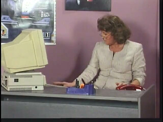 Mature brunette sucks and takes cock by desk at work
