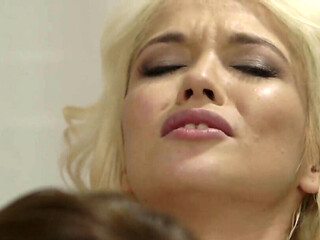 Brunette therapists with big tits massages and licks horny blonde