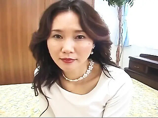 Stunning MILF sucks and rides in hard Japanese porn scene