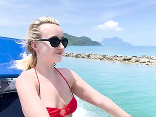 Lovita Fate is having fun on the boat and showing her holes in jeans