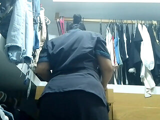 MILF maid masturbates her big ass in her boss's locker room while he works