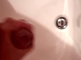 Nicely jerked off in the bathroom