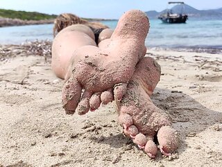 Covered in Sand and Above It All