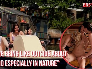 Three German girls walk the shore bare chested