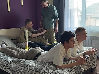 Stepfather and stepson fuck twinks in their tight asses while they play the console