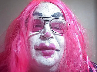 TV clown slut plays with her breasts for you