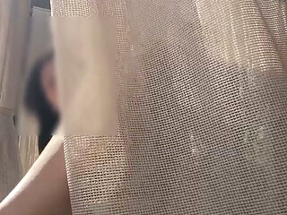 Risky masturbation on a public beach