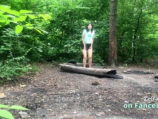 She's pleasuring her pussy  a sweet brunette MILF in the forest, and I'm secretly watching her!