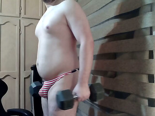 Muscular himbo shows off his patriotism on cam