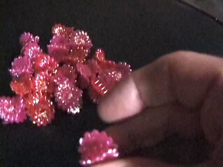 Milf gets strawberry round her tits while gagged and on bondage