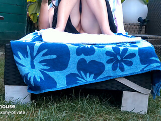 Outdoors on a Lounge Chair