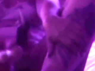 Young Girl Using Her Feet to Play with the Dildo While Masturbating