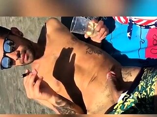 Smoking Latina with Big Tits at an Italian Beach