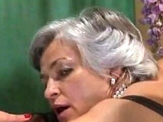 Granny takes on multiple cocks in a gangbang