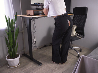 Secretary Working in Ripped Pants