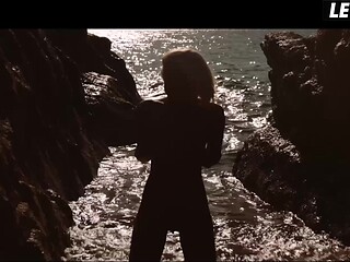 Blonde Beach Babe Rolls Nude in Sand Then Fingers Her Pussy
