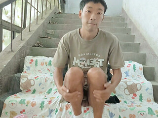 Cute Asian boy enjoys a wonderful time by ejaculating and consuming semen in the ruined stairwell on the eve of his birthday