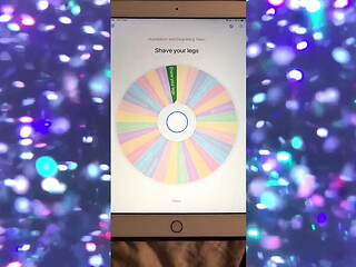Femdom spin-the-wheel game gets dirty in an app recording