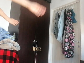 Sexy Latina Having Fun Trying on Clothes and Cutting Them