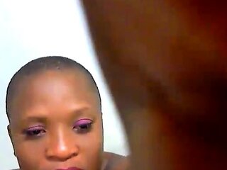 Big-Titted Ebony Webcam Model with a Bald Head