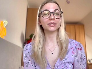 Dominant blonde woman dominates and controls her servant