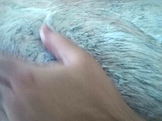 Washing my hairy chest while showering