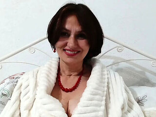 Mature Russian Angela Lady pees on mattress with hairy pussy and big tits