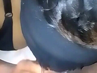 Lady in Bed Sucking My Cock to Make Me Moan and Putting Both Bones in Her Mouth and Sucking the Black Stick