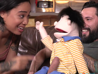 Petite Asian babe rides bearded puppet master stud