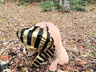 What's This Whore Doing in Those Leaves? on Her Knees?