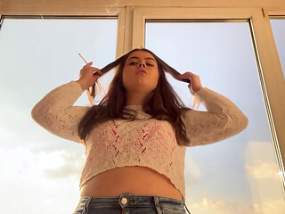 Latina Smoking at Sunset