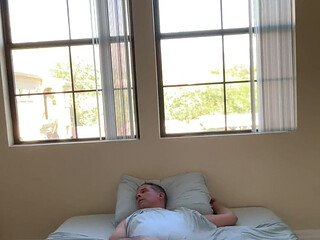 Watching Him Drift Between Shirts and Shorts