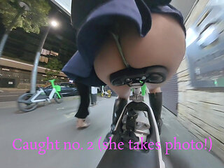 Public exposure on bike in public showing butt plug